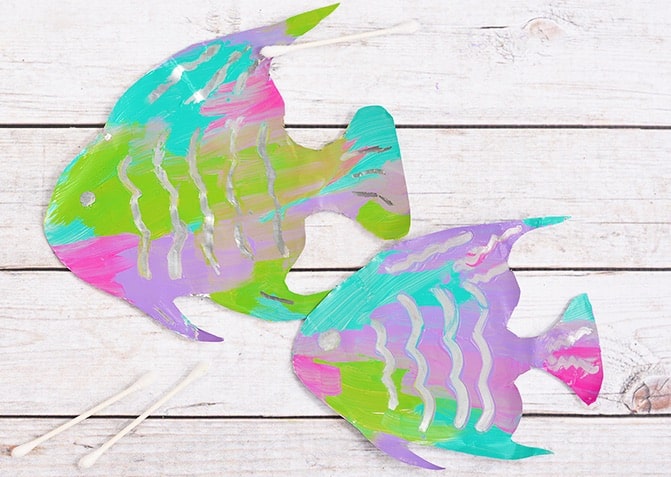 Shiny Happy Fishies Holding Fins